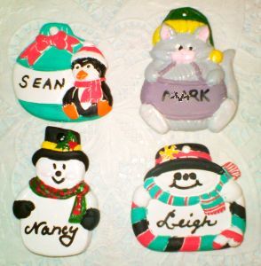 Hand painted plaster ornaments as Christmas party favors or place cards.