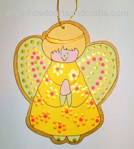 Wooden angel ornament, hand-painted.